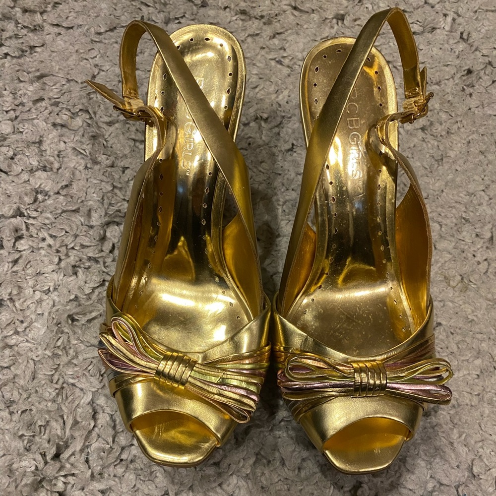 BCBGirls gold/multi-color heels.